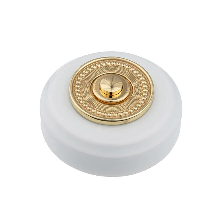 Sonnette filaire porcelaine blanc collerette laiton perlée