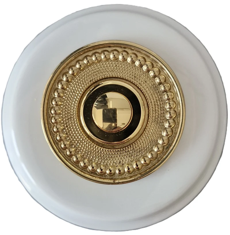 Sonnette filaire porcelaine blanc collerette laiton perlée