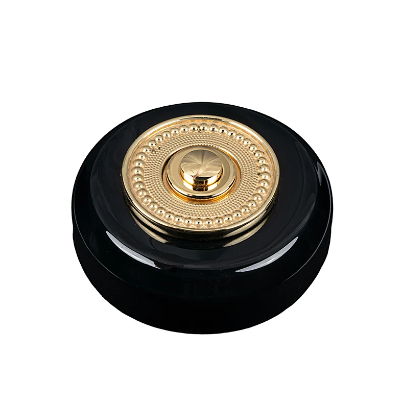 Sonnette filaire porcelaine noir collerette laiton perlee