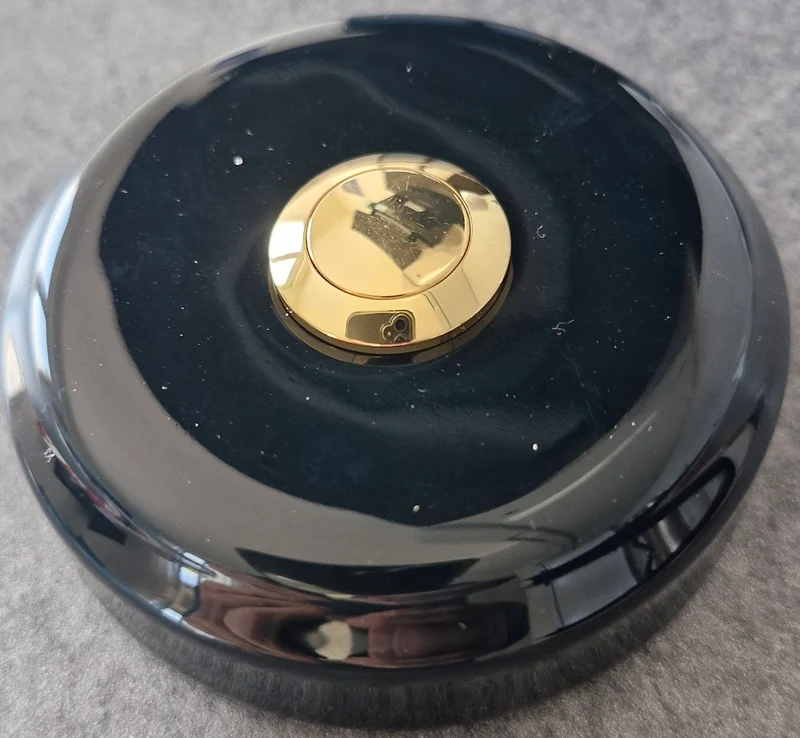 Sonnette filaire porcelaine noir bouton laiton