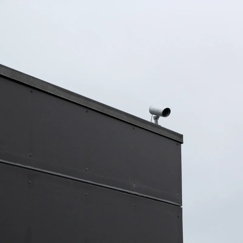 Rotating dummy camera with motion sensor and blue LED
