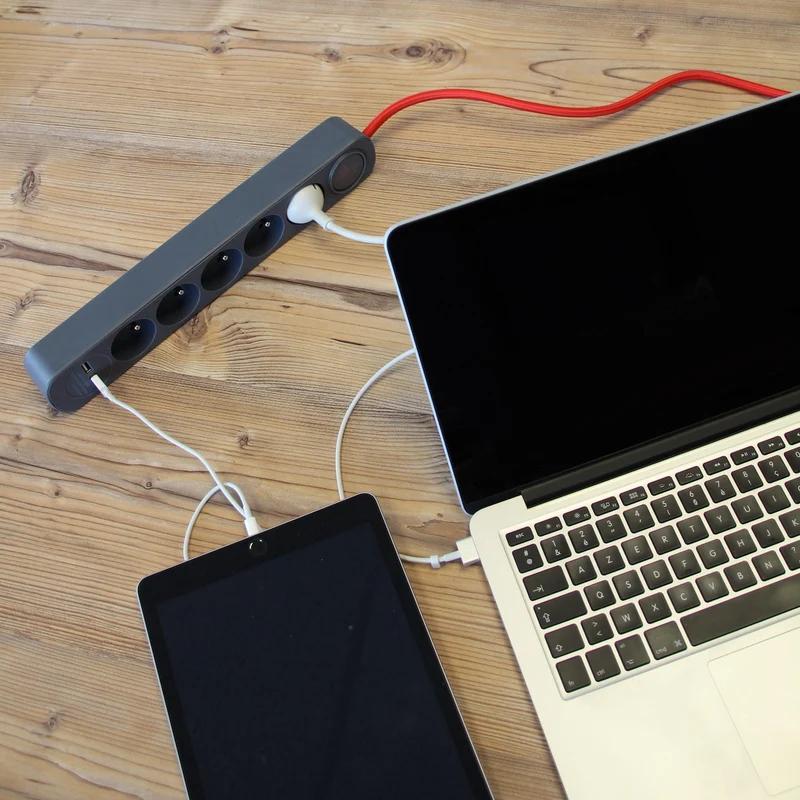 Grey power strip and red textile cable with 2 USB - 1,5m