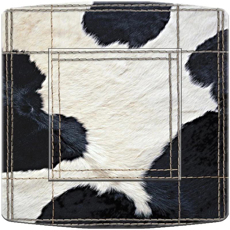 Interrupteur décoré vache noir et blanc