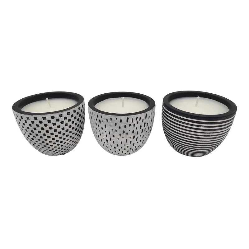 Bougie à la citronnelle dans un pot en décoratif en ciment noir et blanc, choix entre 3 modèles
